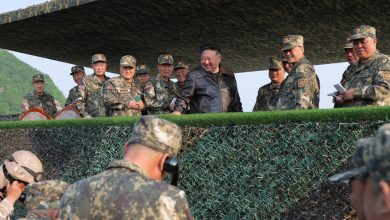 Kim Jong Un Chairs Military Meeting, Oversees Artillery Drills